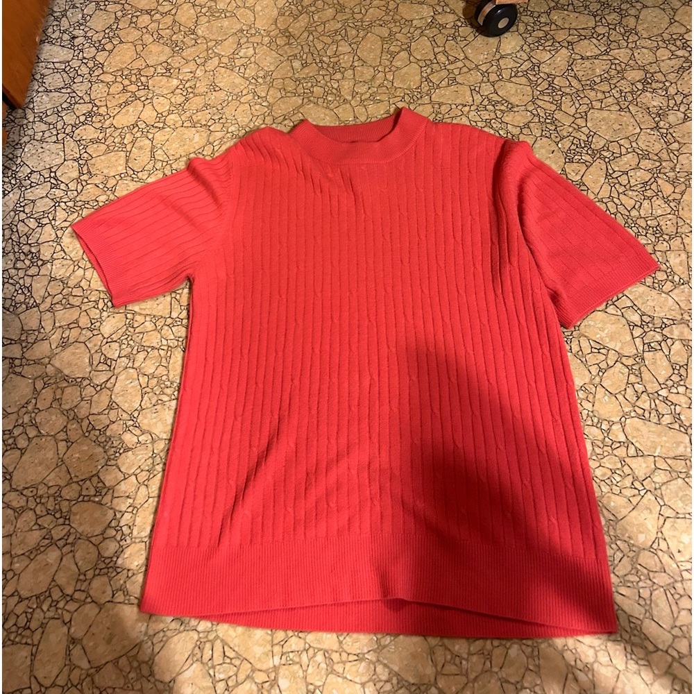 pink turtleneck